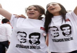 Deniz Gezmişli tişörtle “geri dön” çağrısı